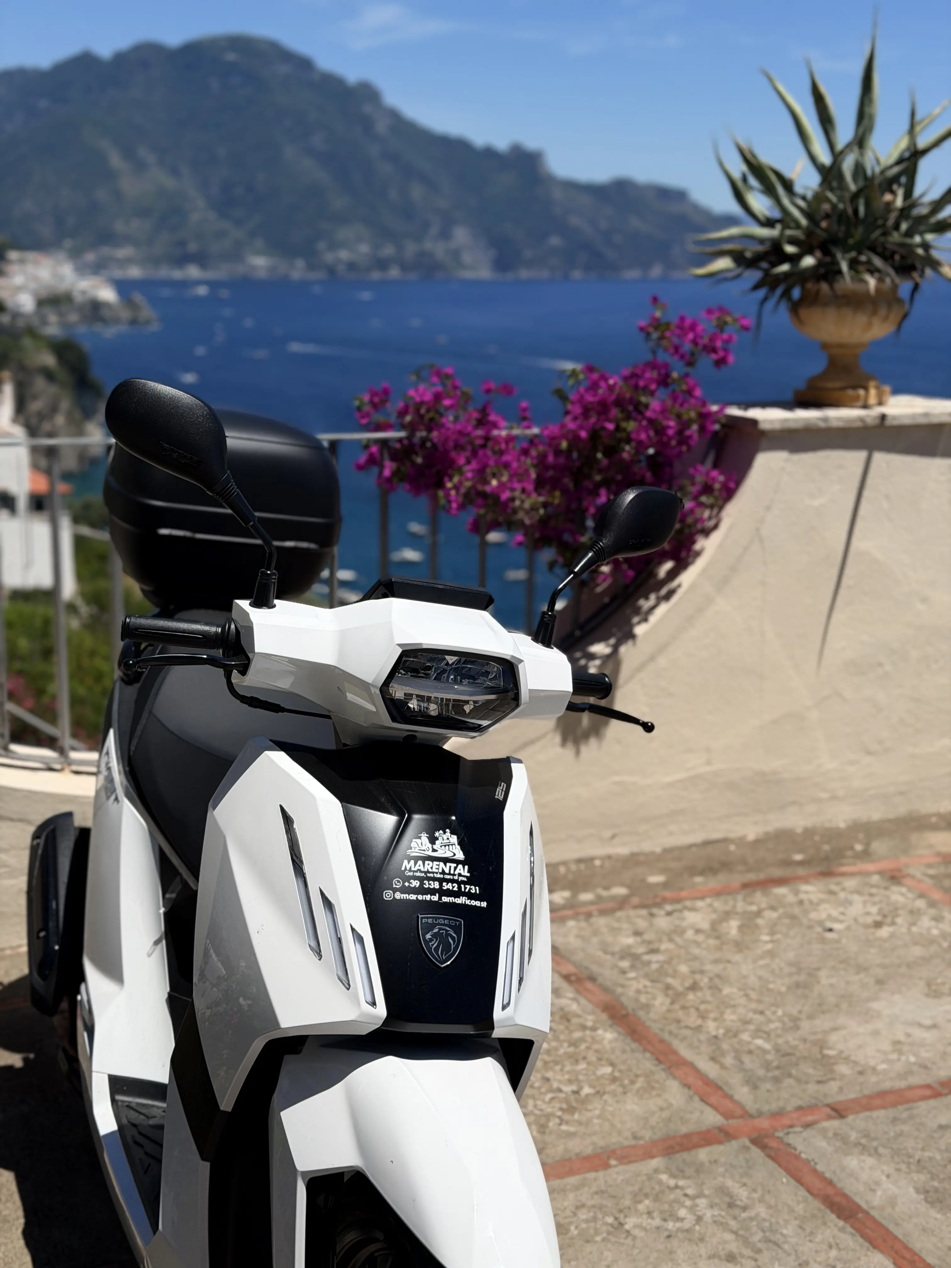 White 125cc scooter available for rental on the Amalfi Coast